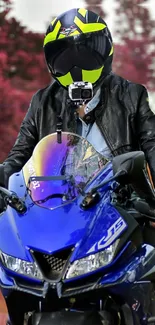 Motorcycle rider with blue bike and helmet