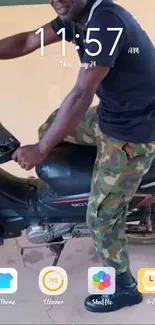 Man in camouflage on motorcycle wallpaper.