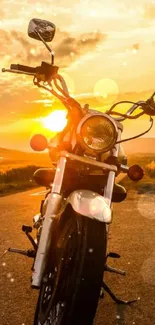 Motorcycle silhouetted against vibrant sunset.