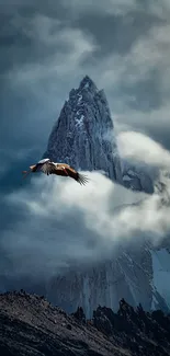 Mountain peak with bird soaring through misty clouds, creating a serene landscape.