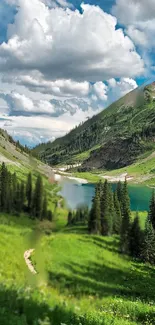 Serene mountain landscape with lake, greenery, and clouds on a mobile wallpaper.