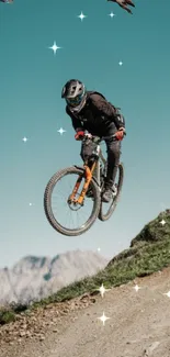 Mountain biker jumps against a scenic blue sky.