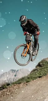 Mountain biker jumping on rocky trail with a scenic backdrop.