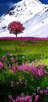 Snowy mountain with pink flower meadow in vibrant wallpaper.