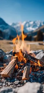 Campfire with mountain landscape backdrop, calm and scenic.