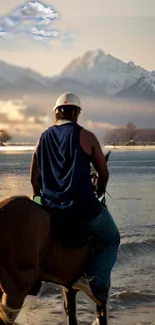 Person on horseback with mountain view, serene and natural setting.