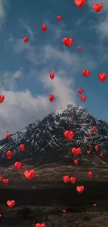 Snowy mountain with red hearts floating in the sky.