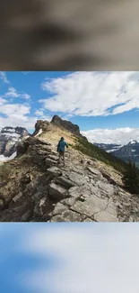 Hiker on rocky mountain trail under a clear, scenic sky.