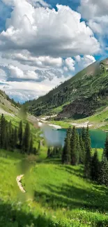 Scenic mountain lake and lush green landscape with a vibrant blue sky.