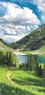 Scenic mountain lake with lush greenery and blue sky.