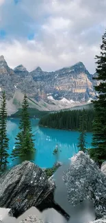 Serene mountain lake with pine trees and turquoise waters.