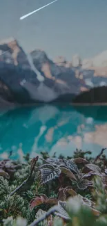 Serene mountain lake with lush greenery in foreground and clear reflections in water.