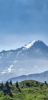 Mountain landscape with blue sky and green hills, perfect for mobile wallpaper.