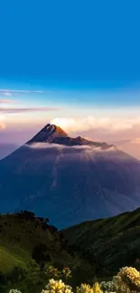 Beautiful mountain peak with sunrise in blue sky.