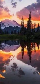 Majestic mountain sunset with sky mirrored on a calm lake in vibrant colors.