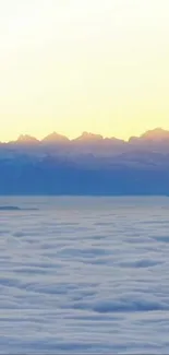 Mountain sunrise above the clouds with a scenic view.