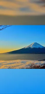 A serene sunrise over a snow-capped mountain, perfect for mobile backgrounds.