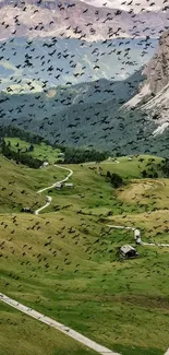 Scenic mountain valley with birds flying overhead, lush green landscape.