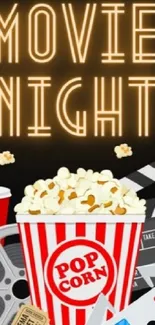 Movie night wallpaper with popcorn bucket and film elements.