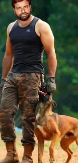 Man in camouflage with Belgian Malinois.