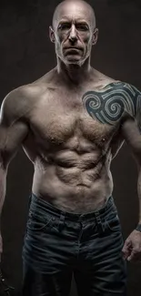 Muscular tattooed man in dark-toned wallpaper.