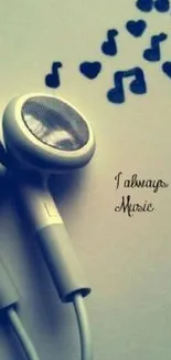 Earphones and musical notes wallpaper with 'I always love music' text.