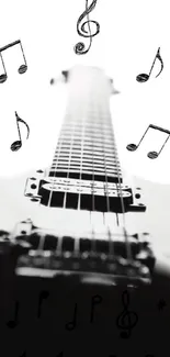 Black and white guitar with musical notes wallpaper.