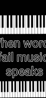 Piano keys with inspirational quote on black background.