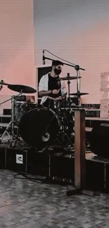 Musician playing drums at a concert