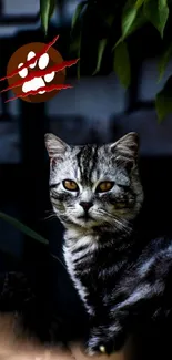 Mysterious cat with yellow eyes in shadows, surrounded by leaves.