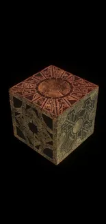 Dark cube with intricate patterns on black background.