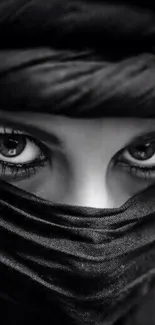 Black and white portrait showcasing mysterious eyes.