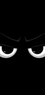 Minimalistic wallpaper featuring mysterious, bold eyes on a deep black background.