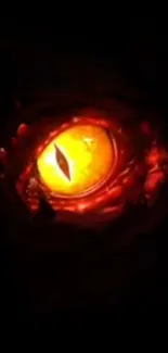 Mysterious fiery eye on dark background wallpaper.