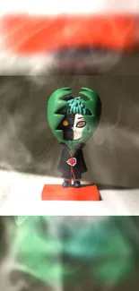 Green-hooded figurine surrounded by smoke effect.