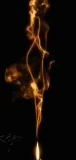 Mysterious flame forming a human silhouette on black background.