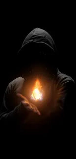 Hooded figure holding a bright flame, set against a dark background.