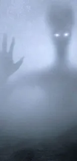 Eerie foggy scene with shadowy figure and glowing eyes.