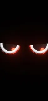 Mysterious glowing eyes against a dark background.