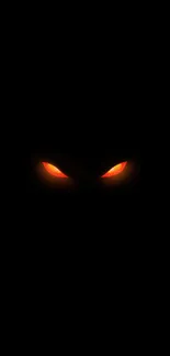 Wallpaper with mysterious glowing orange eyes on a dark background.