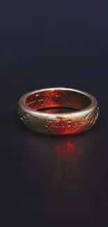 Enigmatic glowing ring with inscriptions on dark background for mobile wallpaper.