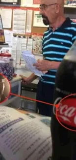 A man in a striped shirt in a store aisle, with a close-up of a Coke bottle.