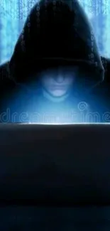 Hooded figure with laptop and glowing screen on blue background.