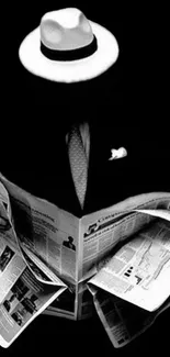 Silhouette of a man with hat reading newspapers, in a monochrome style.