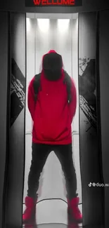 Mysterious hooded figure in vibrant red against an elevator backdrop.