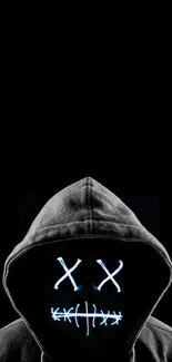 Hooded figure with a glowing stitched face in a dark, mysterious mobile wallpaper.