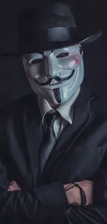 Mysterious person in suit wearing a mask.