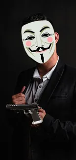 Mysterious person in a mask holding a gun against a dark background.