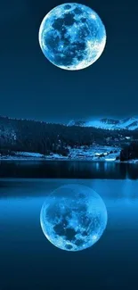 Luminous blue moon reflecting on calm lake at night.