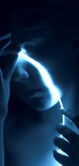 Mysterious face with neon blue light in dark ambiance.